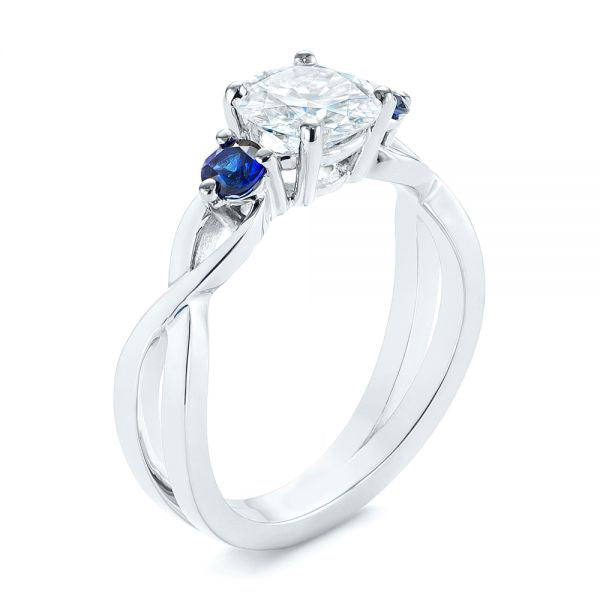 Three Stone Blue Sapphire Engagement Ring - EC057 With 0.3 Carat Round Shape Natural Diamond